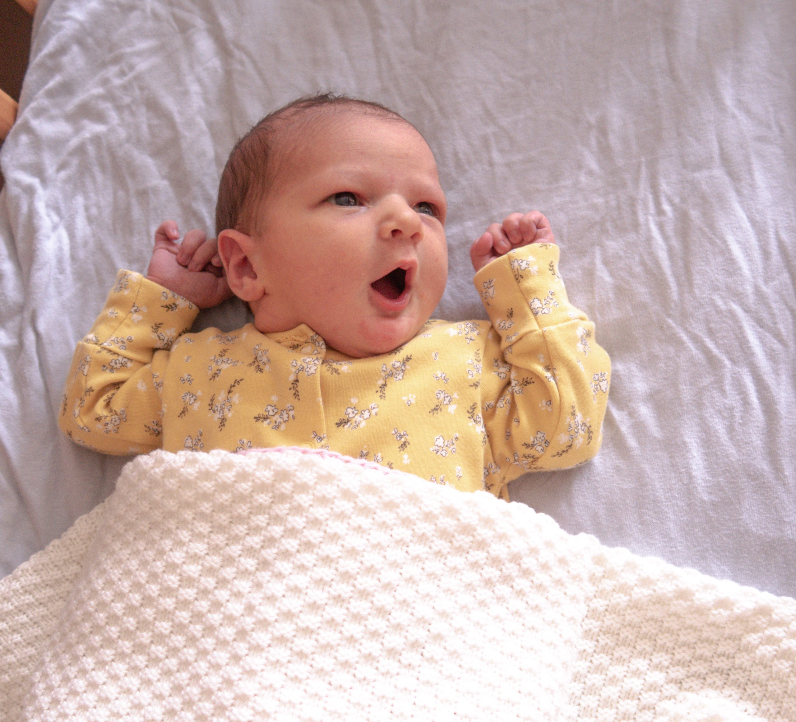 baby looking shocked