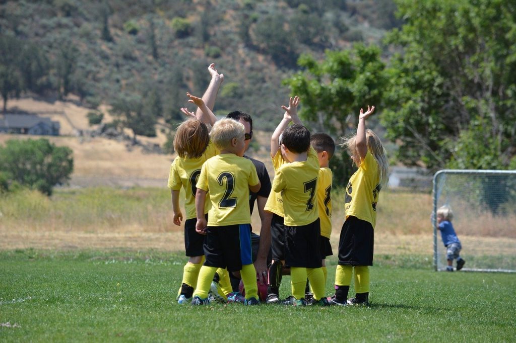 football club for 5-year-olds huddle