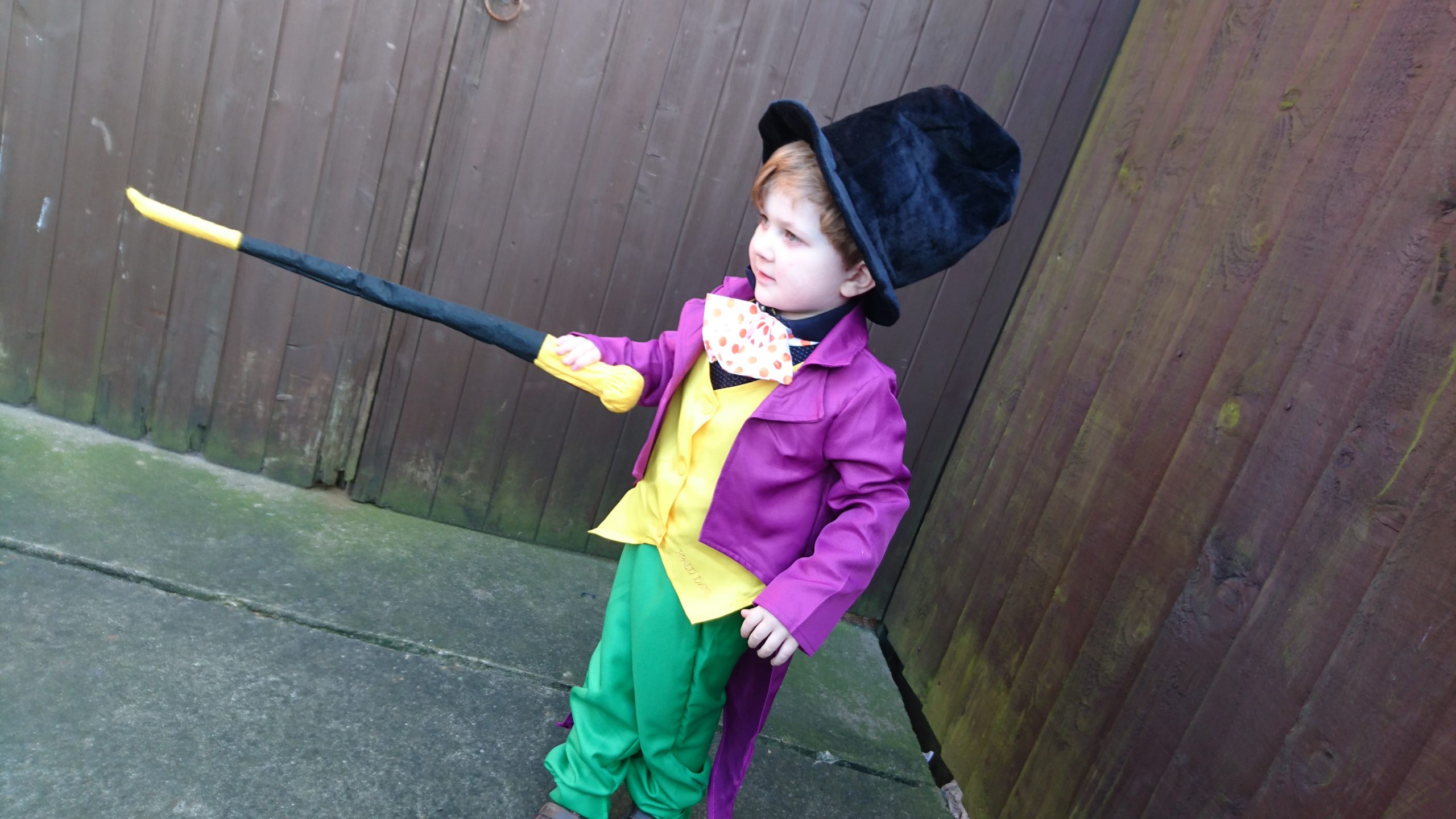 teaching your child good manners 3 year old dressed in top hat and tails