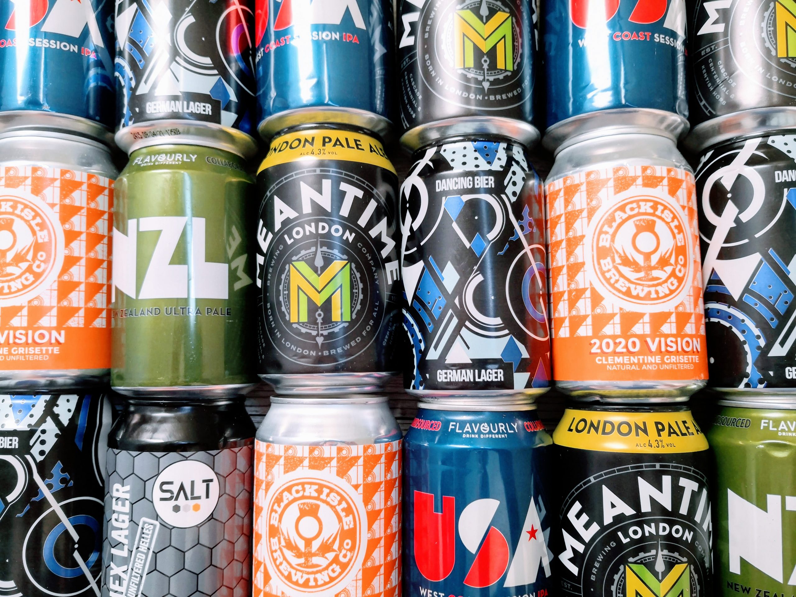 close up of a wall of craft ale cans