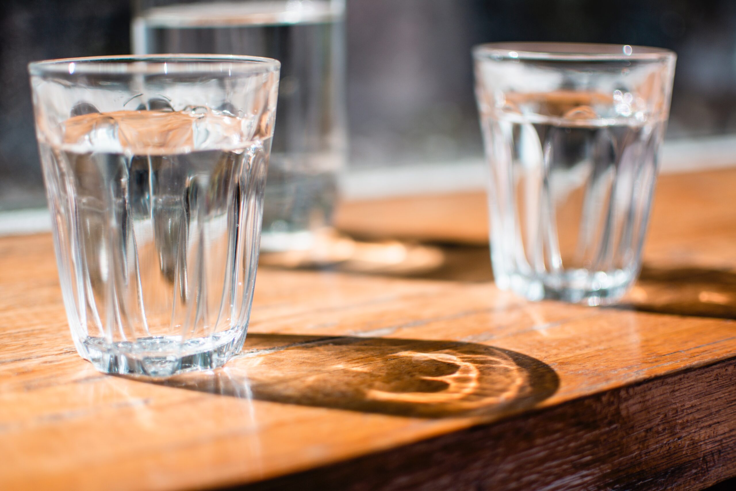 glasses of water to aid breastfeeding