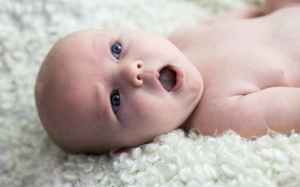 Baby yawning. Possibly after reading newborn advice for dads. What does she know, babies can't read anyway