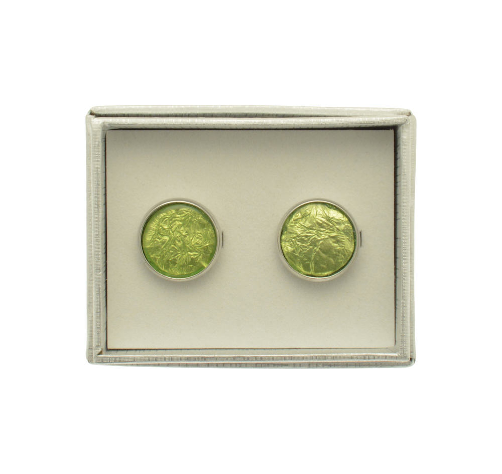 green cufflinks in box