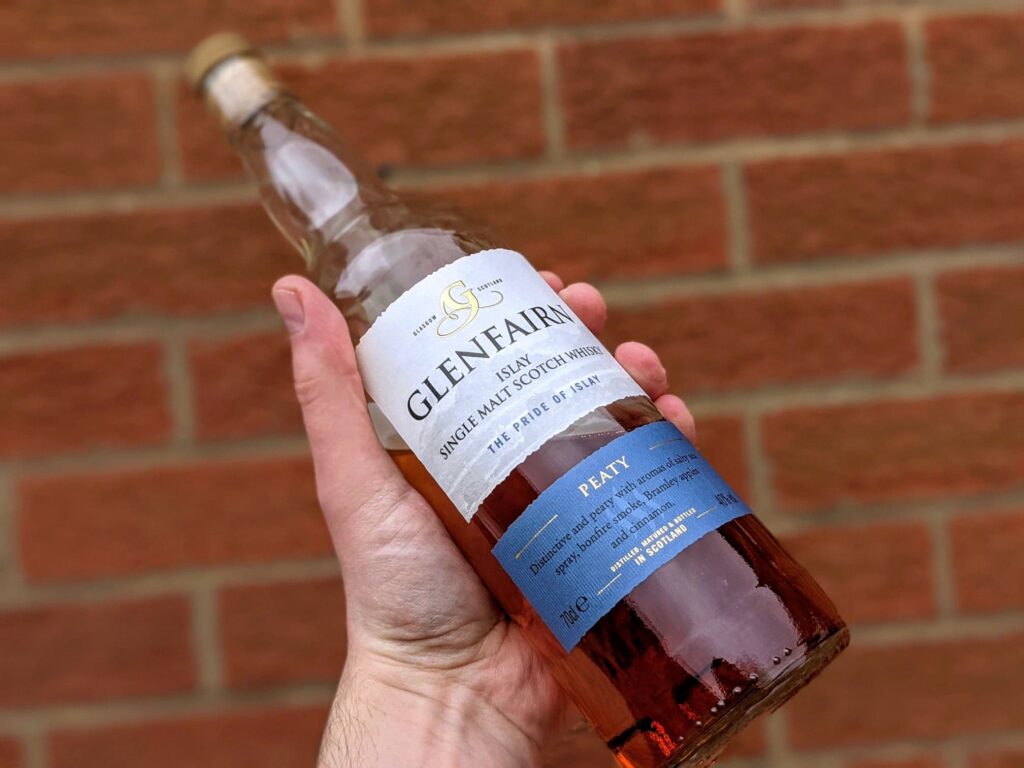 glenfairn islay whisky bottle against a wall