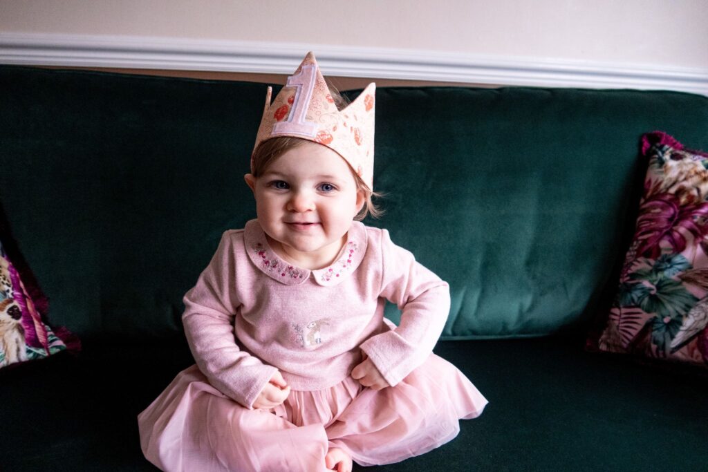 my little girl in her birthday dress and crown