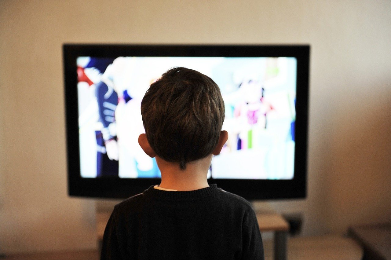 kid in front of tv