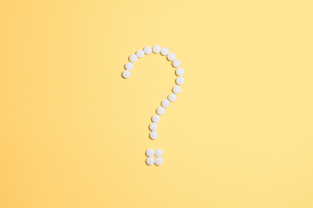 question mark made out of white beads