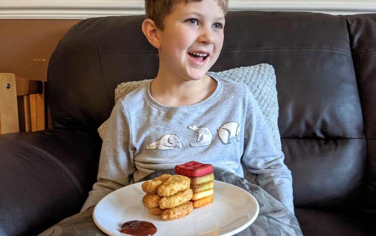 My son with some weirdly stacked food