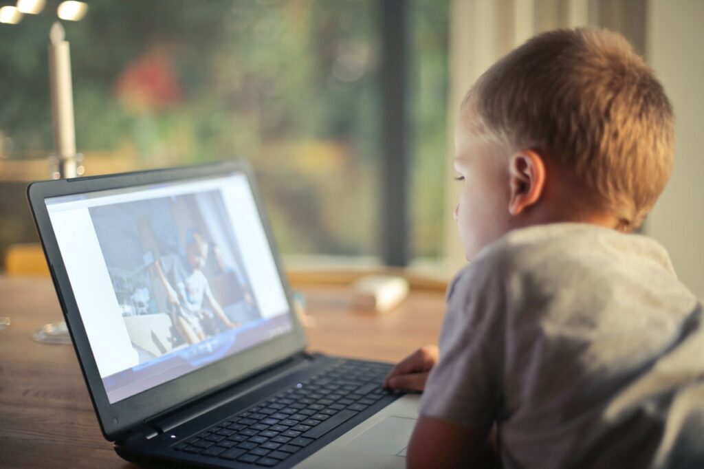 kid on computer
