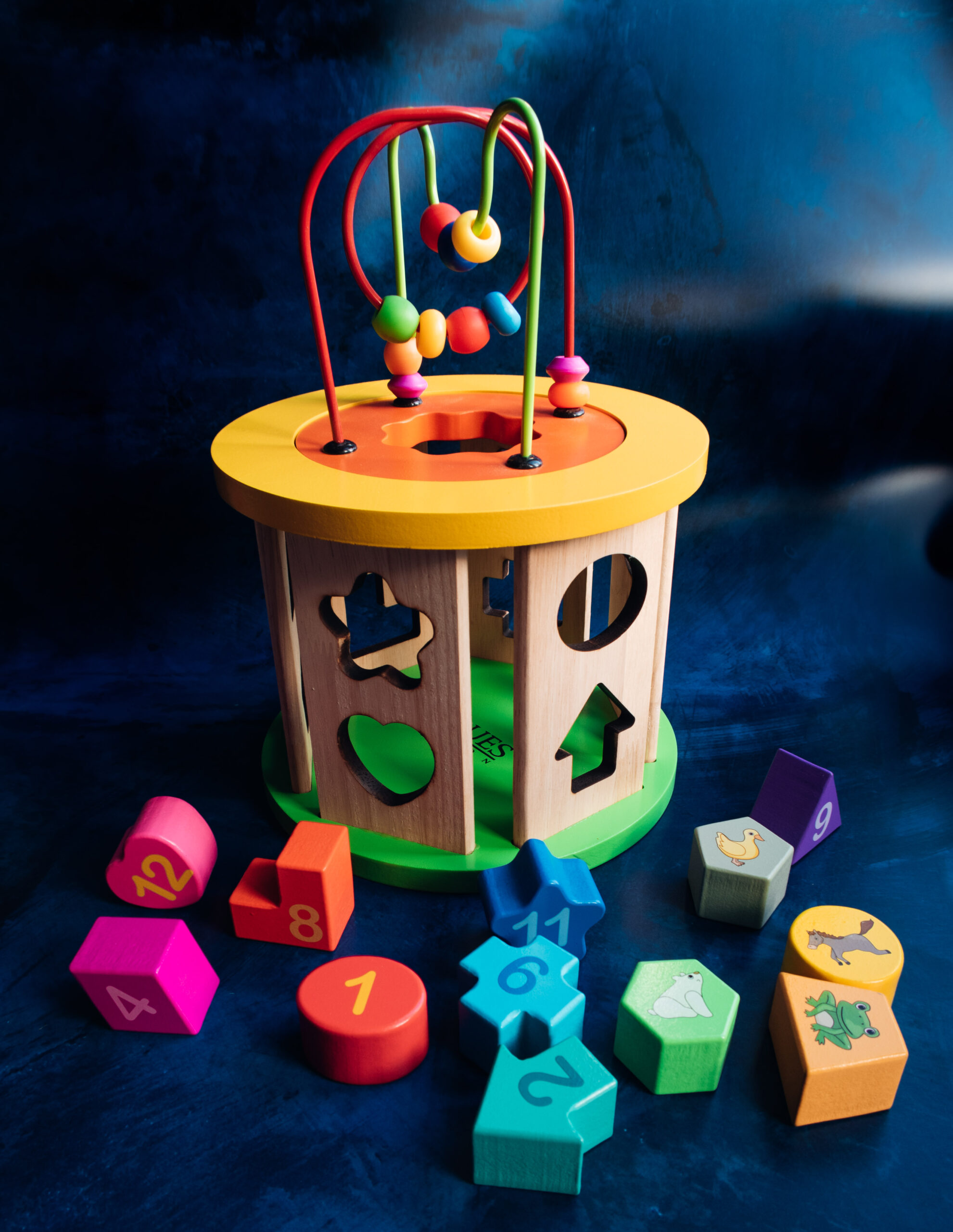 wooden activity cube used for jaques toy review