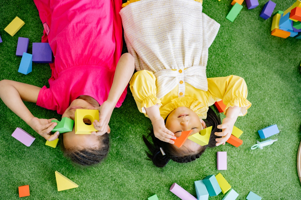 kids laying down playing