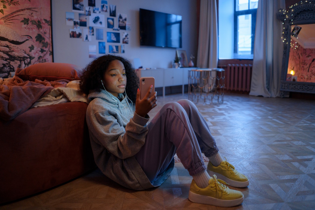 teenager staring at phone