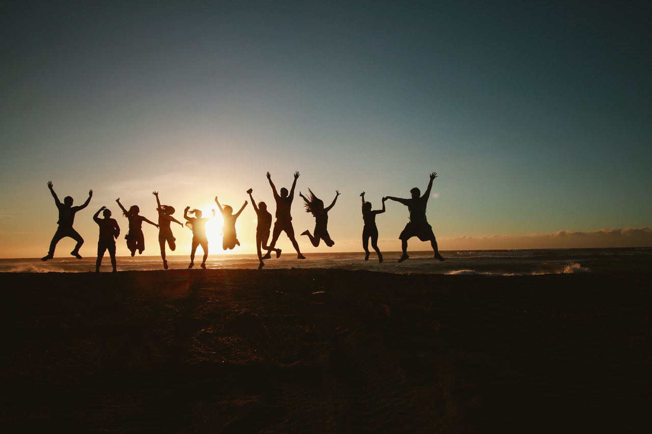 silhouettes of kids jumping