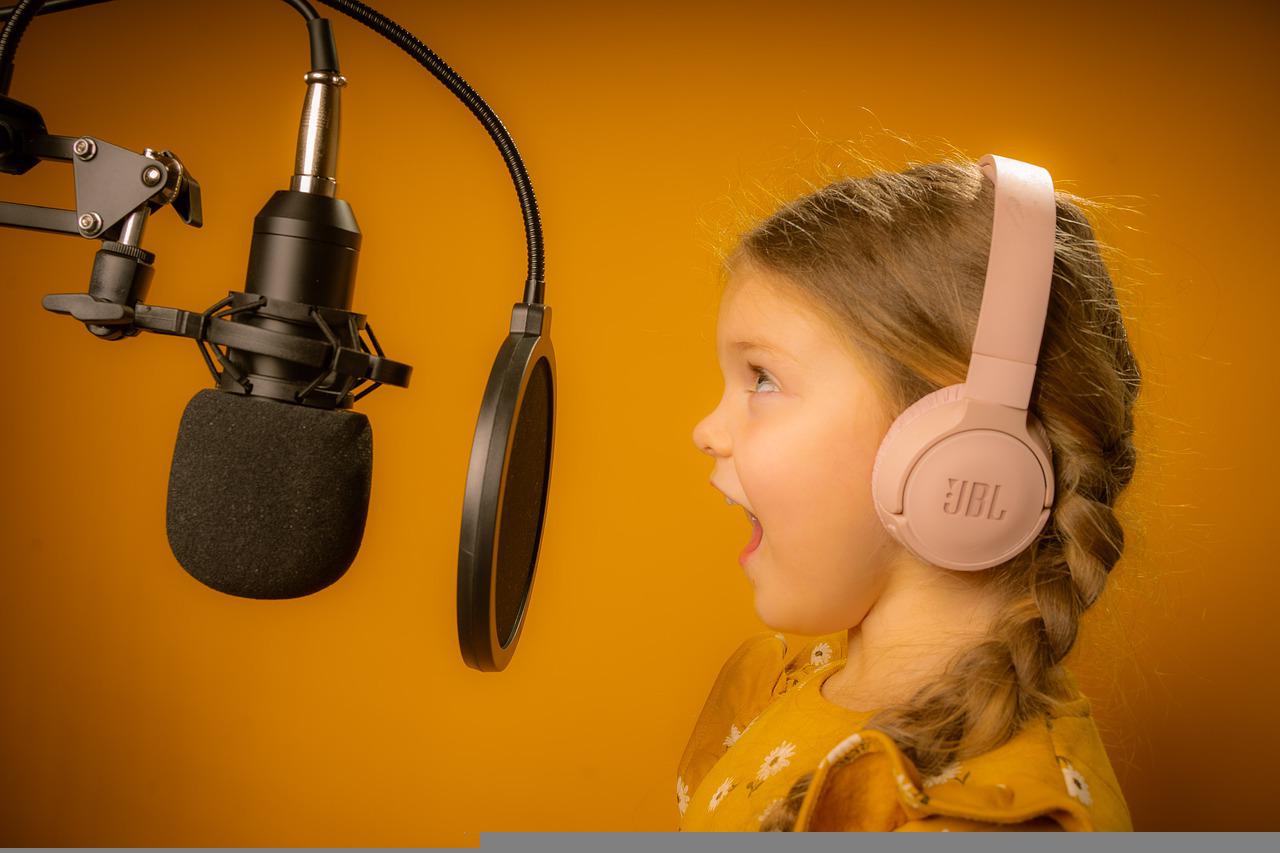 kid singing into mic