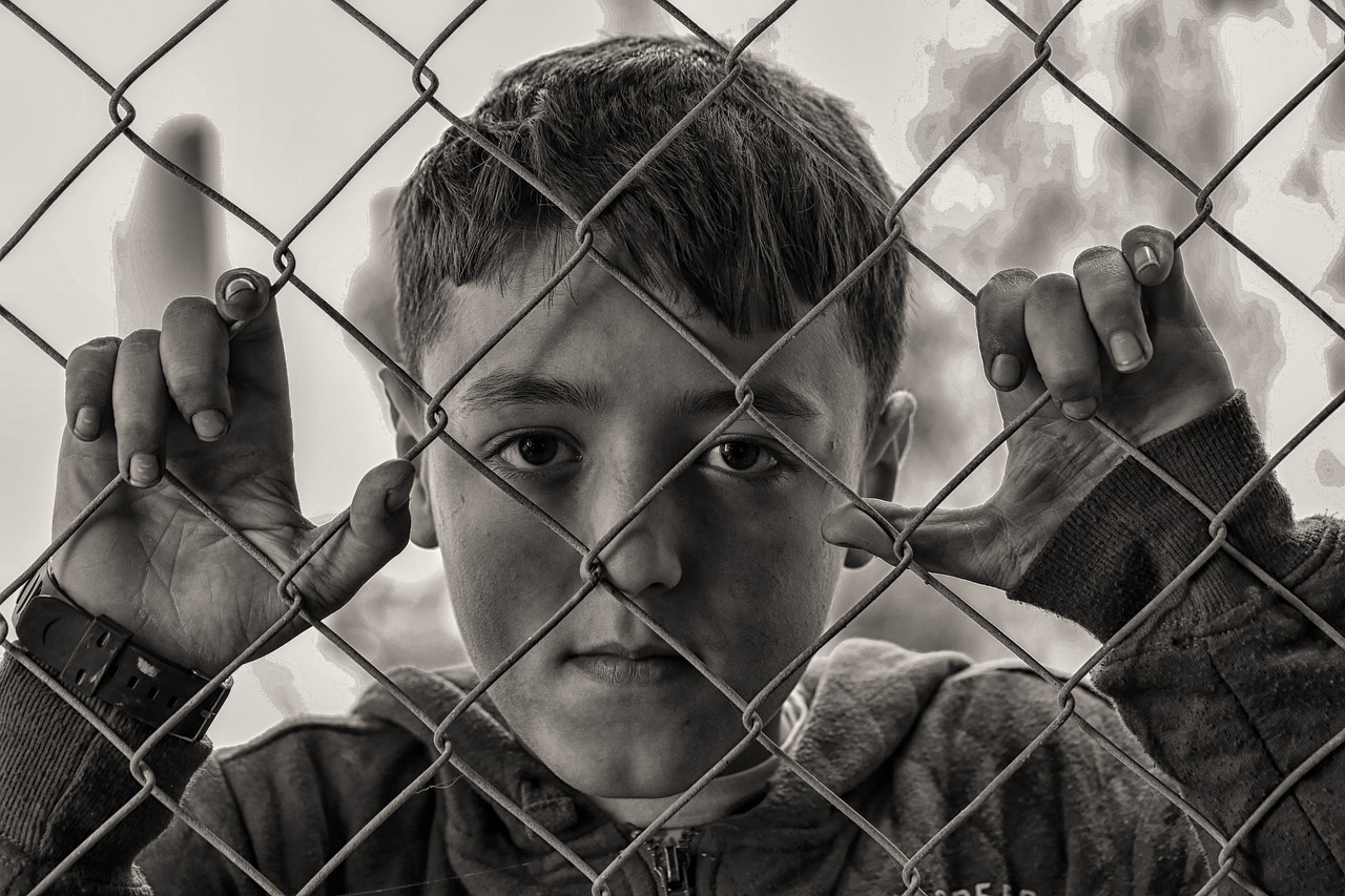 boy at fence