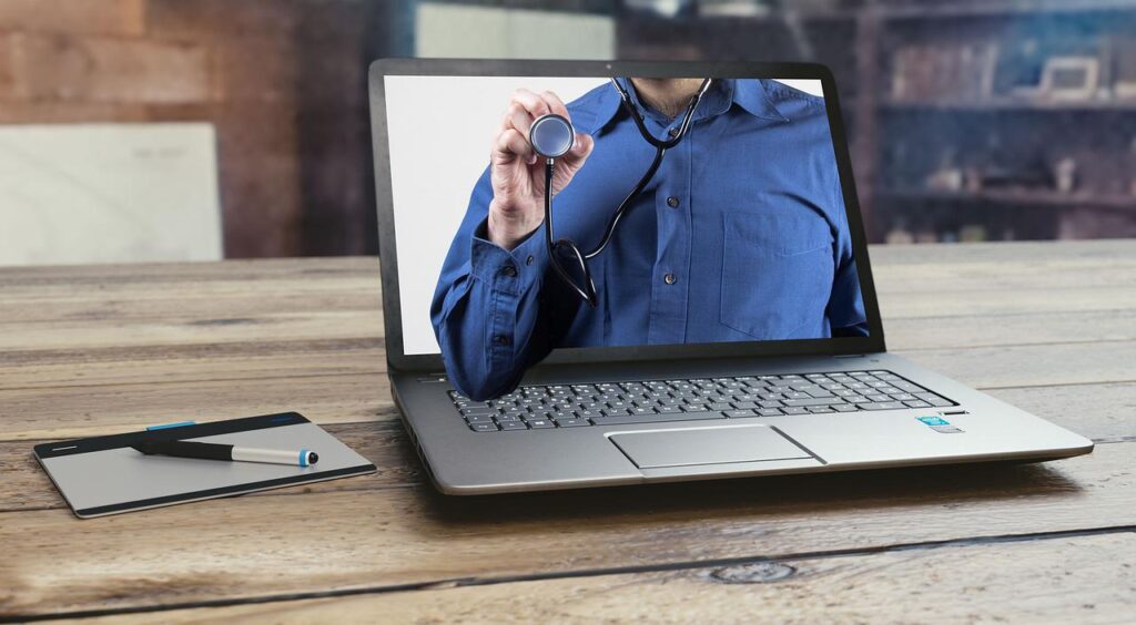 doctor reaching through screen