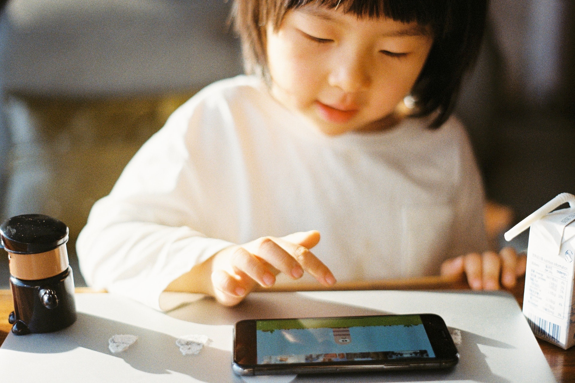 kid on mobile phone