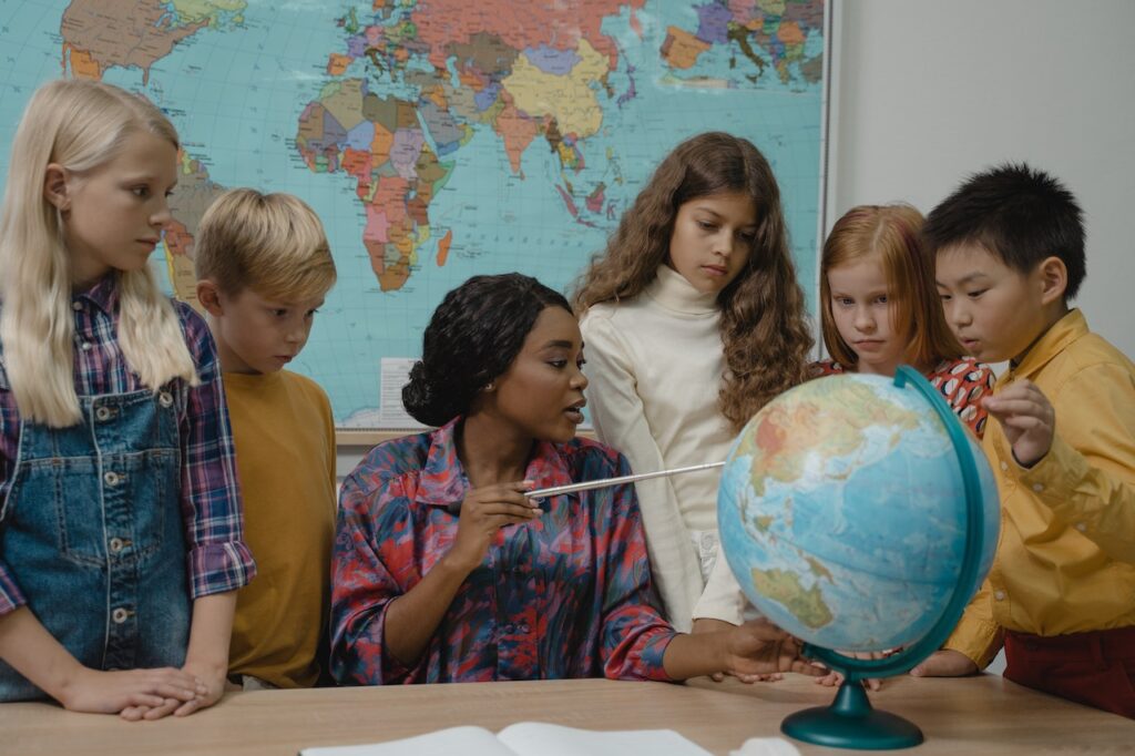 teacher and globe