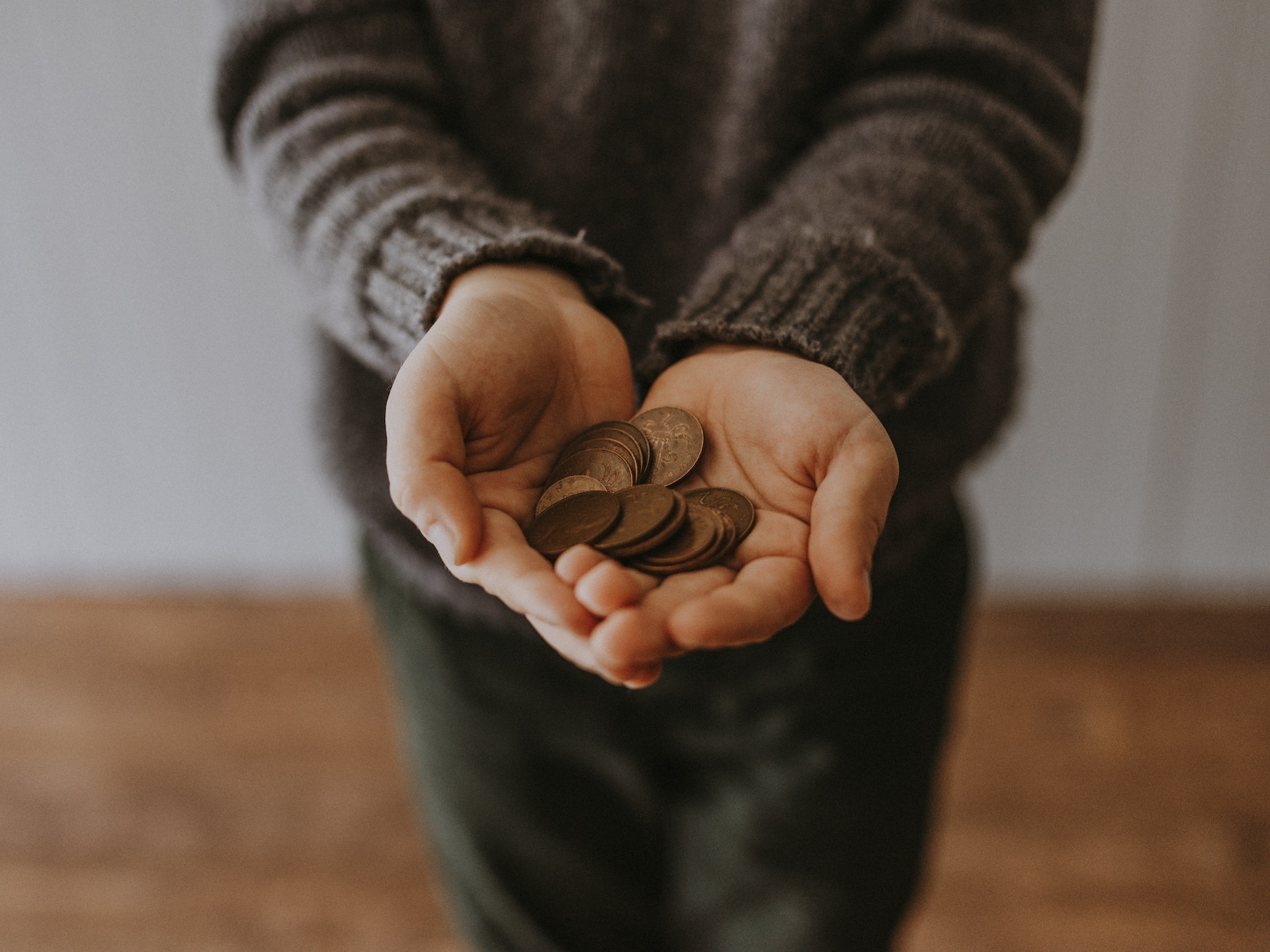 hands full of coins