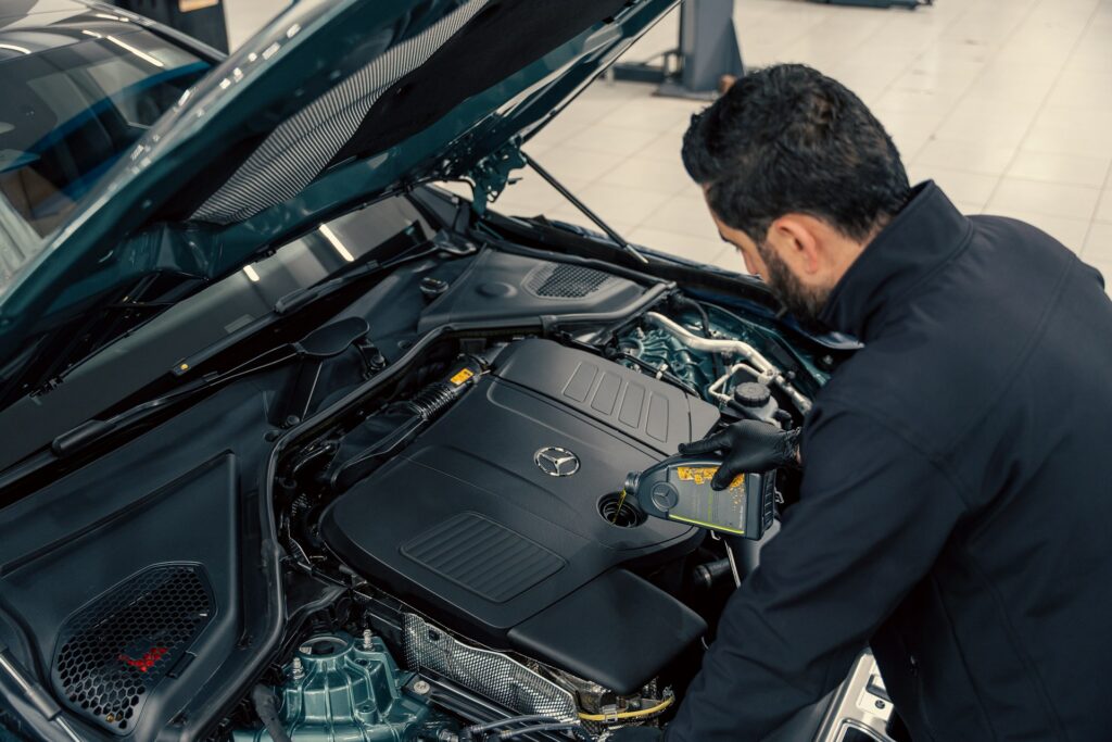 mechanic working on car